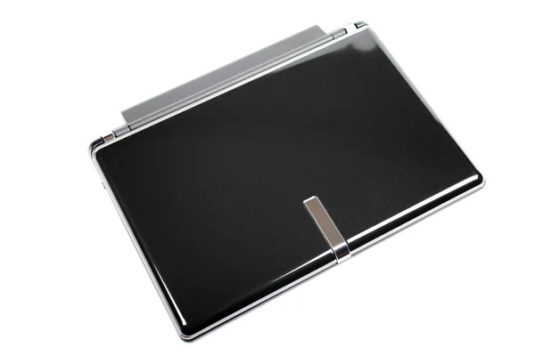 Fekete zárt notebook elszigetelt fehér background. — Stock Fotó
