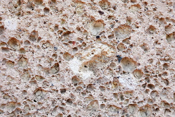 織り目加工の背景または背景としてピンクの石灰岩. — ストック写真