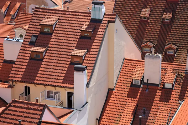 Houses in Prague, covered with tile. — Stock Photo, Image