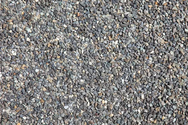 Piedras agregadas como fondo texturizado . — Foto de Stock