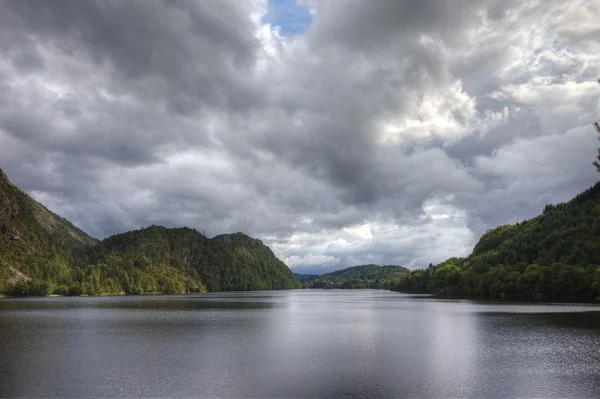 Norwegian lake and dramatic sky, Europe. — Stock Photo, Image