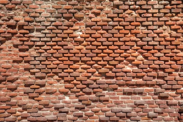 Стара вивітрена цегляна стіна як текстура . — стокове фото