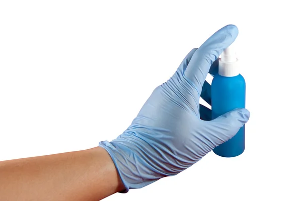 stock image Hand with glove pressing spray can