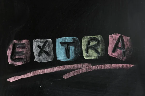 "Extra "parola scritta sulla lavagna — Foto Stock