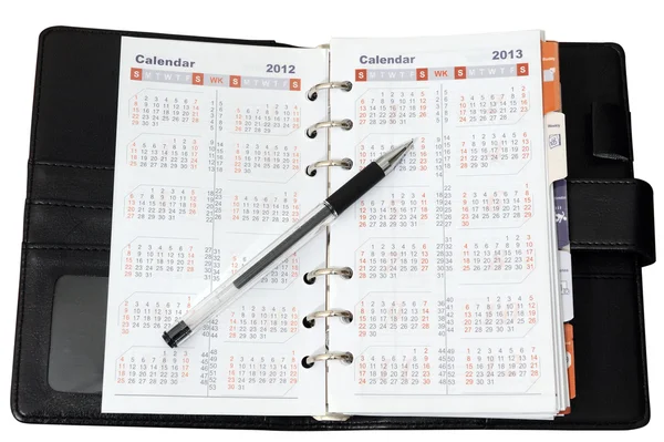 Kalendarz w notebooku z piórem — Zdjęcie stockowe