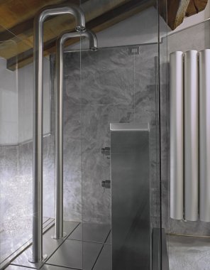 Modern shower cubicle in a modern bathroom clipart