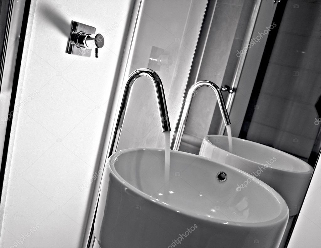 Detail of modern washbasin and faucet