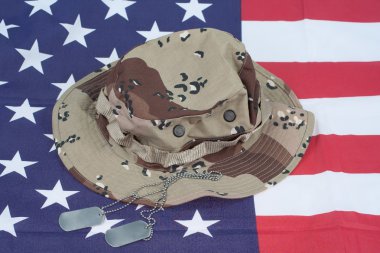 US Flag with Camouflage Combat Hat and Dog Tags clipart