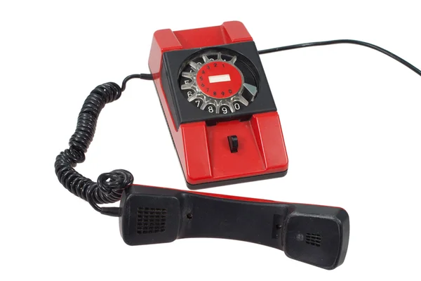 Teléfono retro rojo aislado sobre un fondo blanco —  Fotos de Stock