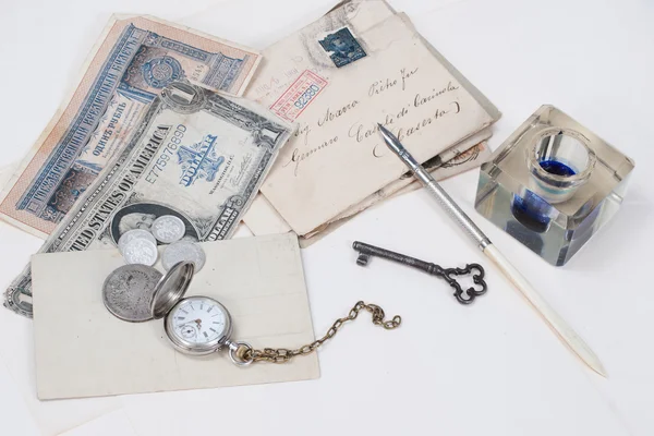 Vintage background with old pocket watch, old ink pen, handwritten letters and old ink pot — Stock Photo, Image