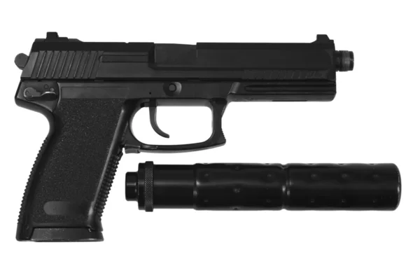 Шпионский пистолет с глушителем на белом фоне — стоковое фото