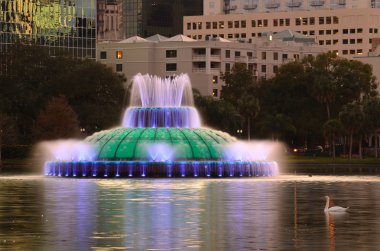 Fountain in City Park Lake clipart
