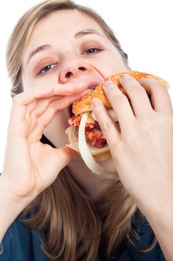 Woman eating hamburger clipart