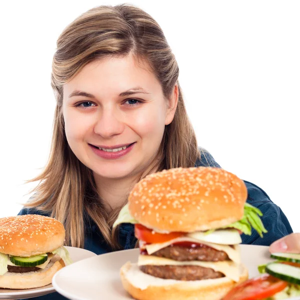 Mulher feliz com hambúrgueres — Fotografia de Stock