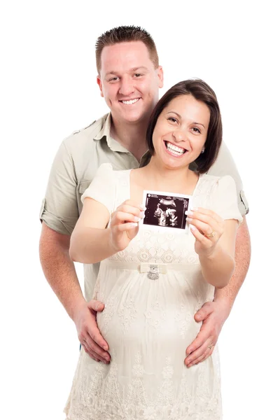 Happy pregnant couple showing ultrasound picture — Stock Photo, Image