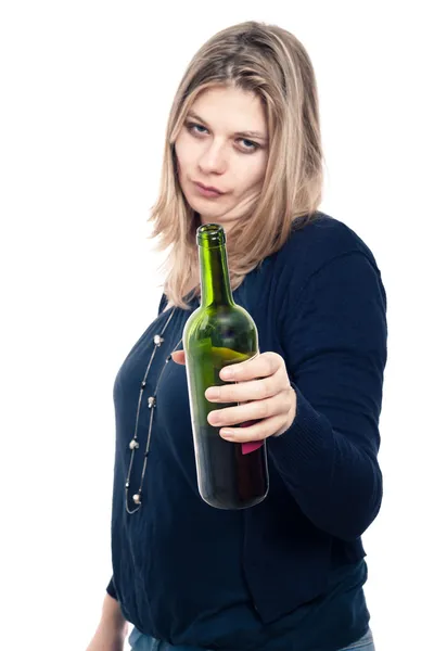 Frustrated drunk woman holding bottle of wine — Stock Photo, Image