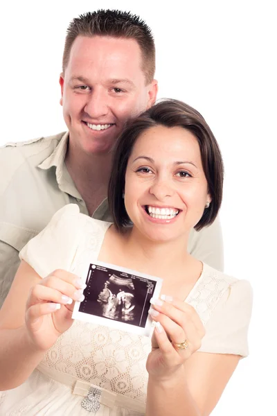 Feliz casal grávida com imagem de ultra-som — Fotografia de Stock