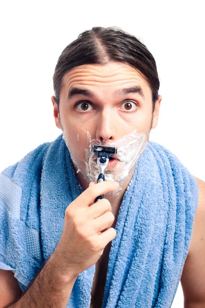 Šokovaný muž holení — Stock fotografie