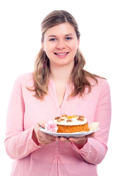 Happy woman in pink with carrot cake — Zdjęcie stockowe