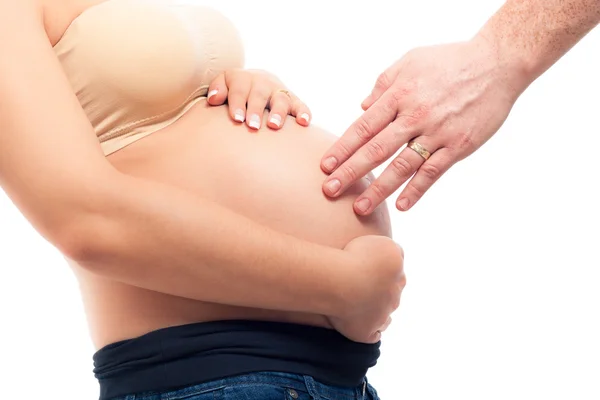 Male hand touching pregnant woman belly — Stock Photo, Image