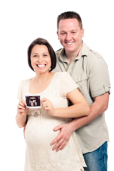 Feliz pareja embarazada con imagen de ultrasonido —  Fotos de Stock