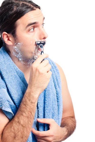 Mladý muž holení po koupeli — Stock fotografie