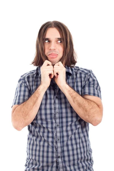 Man making funny faces holding his long hair — Stock Photo, Image