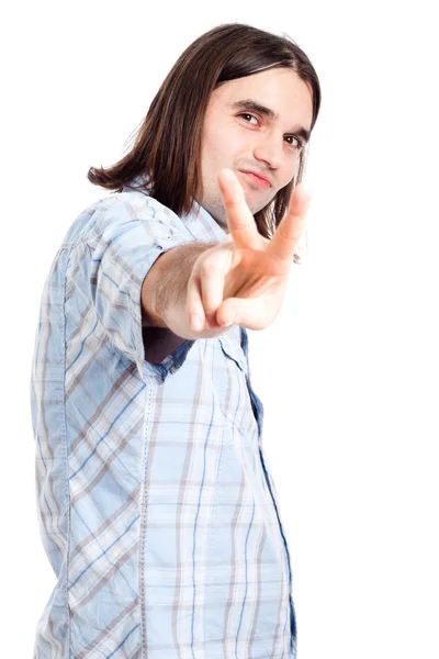 Confident man gesturing v sign — Stok fotoğraf