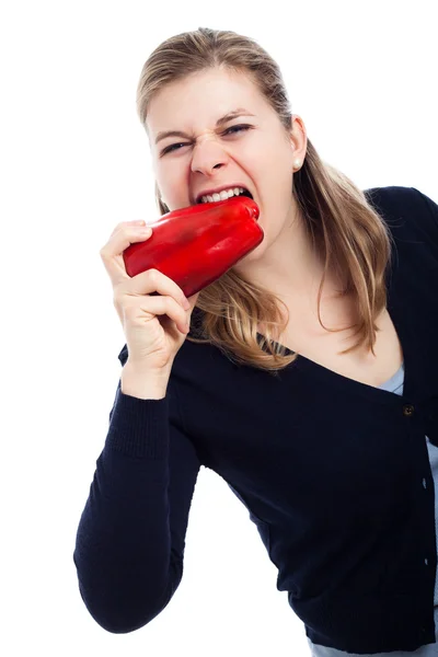 Honger vrouw eten van paprika — Stockfoto