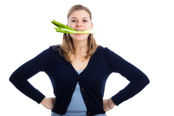 Funny woman with fresh spring onion — Stock Photo, Image