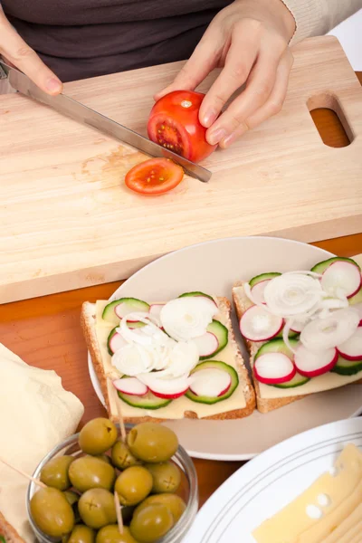 Cutting fresh tomato — Stock Photo, Image