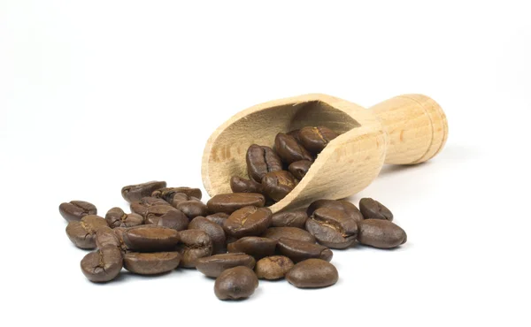 Frische Kaffeebohnen und Schaufel — Stockfoto
