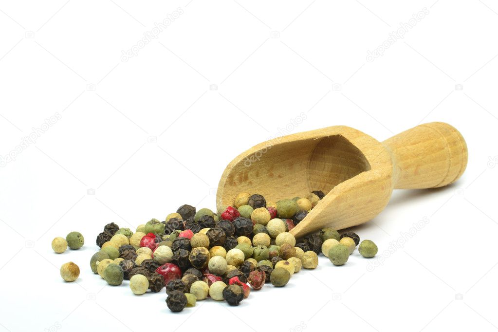Pepper corns and wooden scoop
