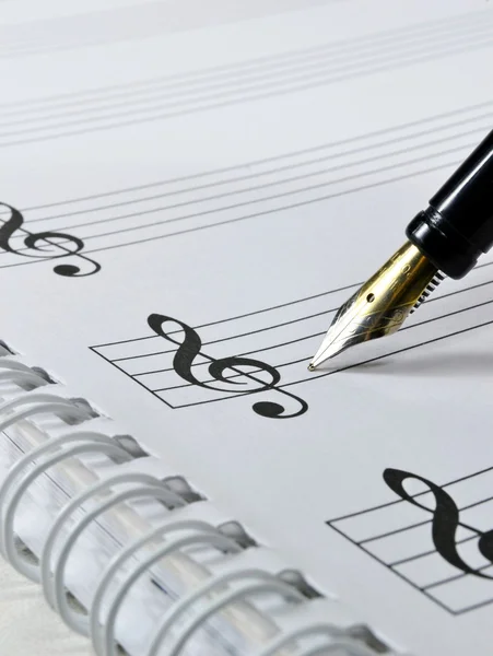 stock image Blank sheet music with pen