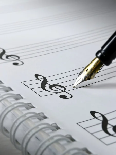 stock image Blank sheet music with pen