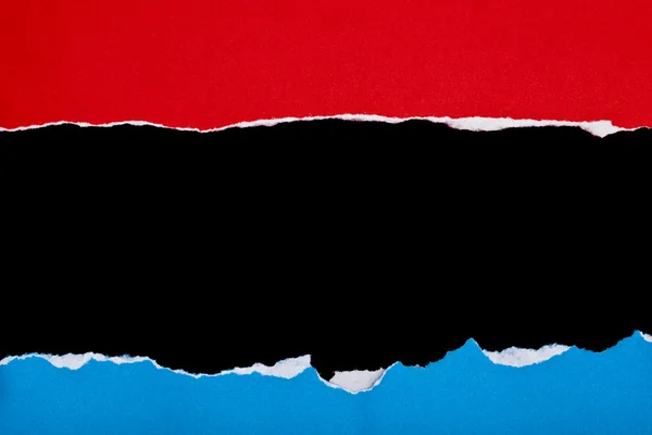 Papier déchiré rouge et bleu — Photo