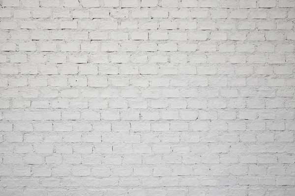Witte bakstenen muur Stockfoto