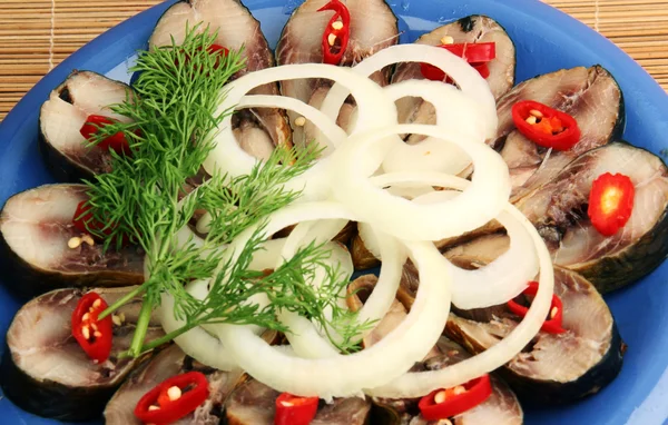 Smoked fish slices, onion and dill — Stock Photo, Image