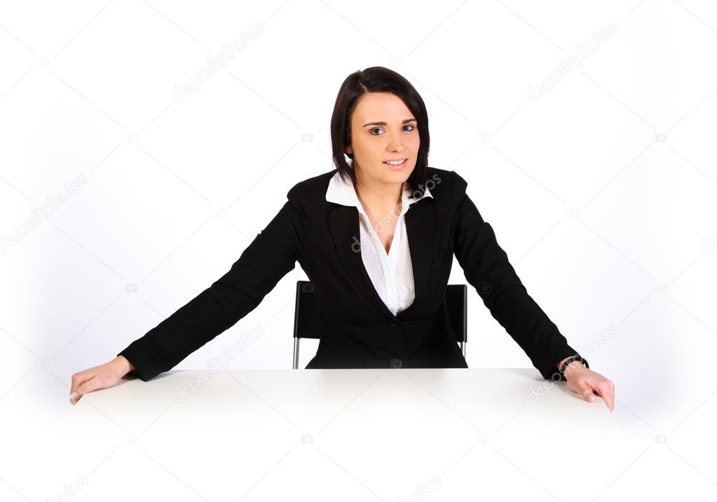 Brunette woman by white table