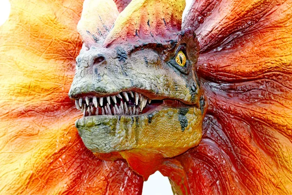 Dilophosaurus dinosaur with orange collar — Stock Photo, Image