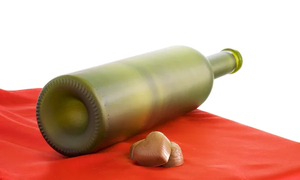 Chocolate and a bottle wine — Stock Photo, Image