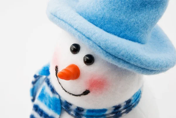 Snowman in a blue hat — Stock Photo, Image