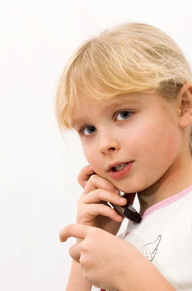 Girl talking on a cell phone — Stock Photo, Image