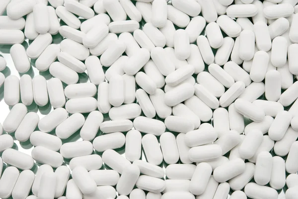 Hintergrund weißer Tabletten — Stockfoto
