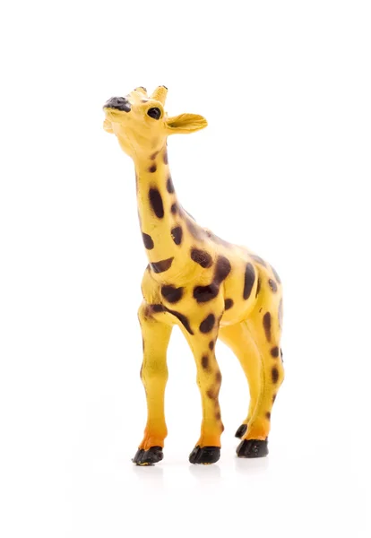 Girafa de brinquedo isolada — Fotografia de Stock