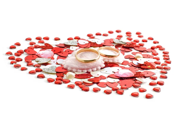 Wedding rings on the heart — Stock Photo, Image