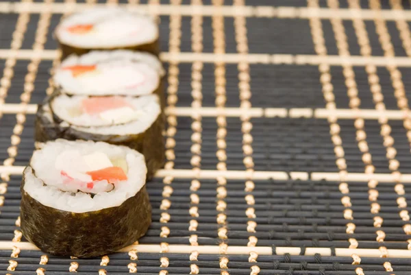 Sushi no tapete — Fotografia de Stock