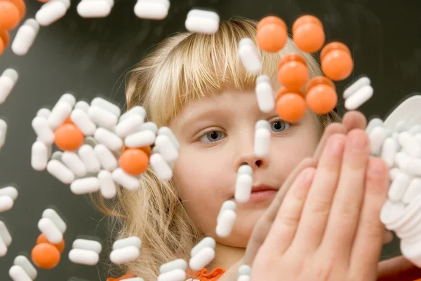 Child playing with drugs Stock Photo