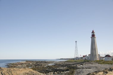 Lighthouse and village clipart