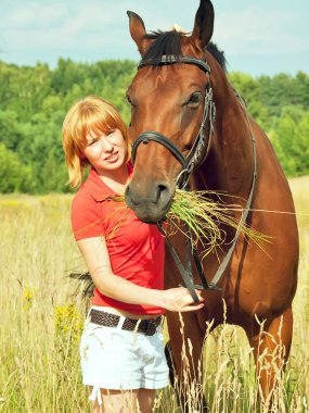 Young pretty girl with her horse clipart